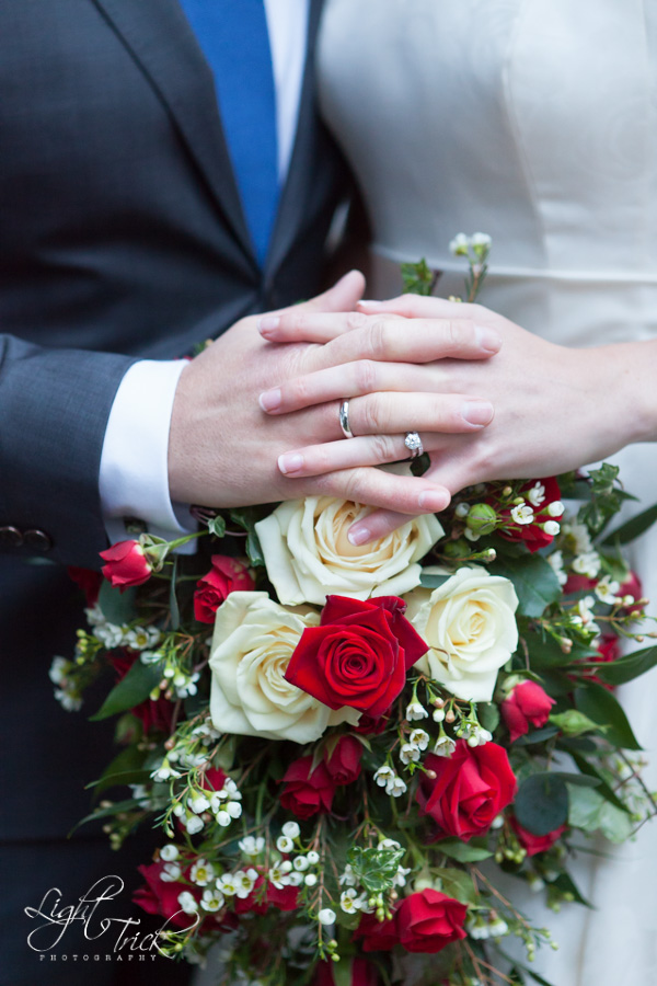 wedding rings with bouquet